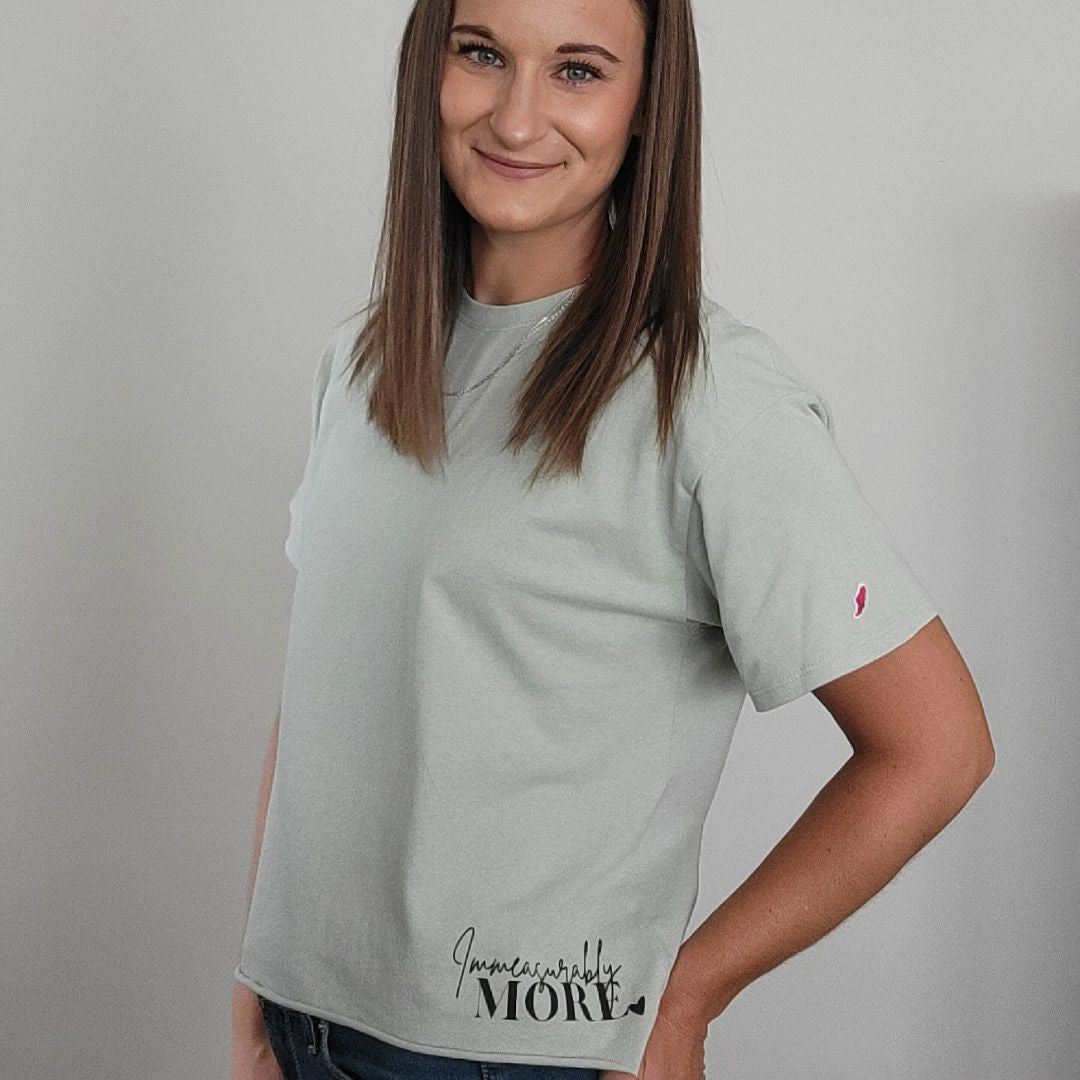 Immeasurably More Clothesline Cotton Crop T-Shirt